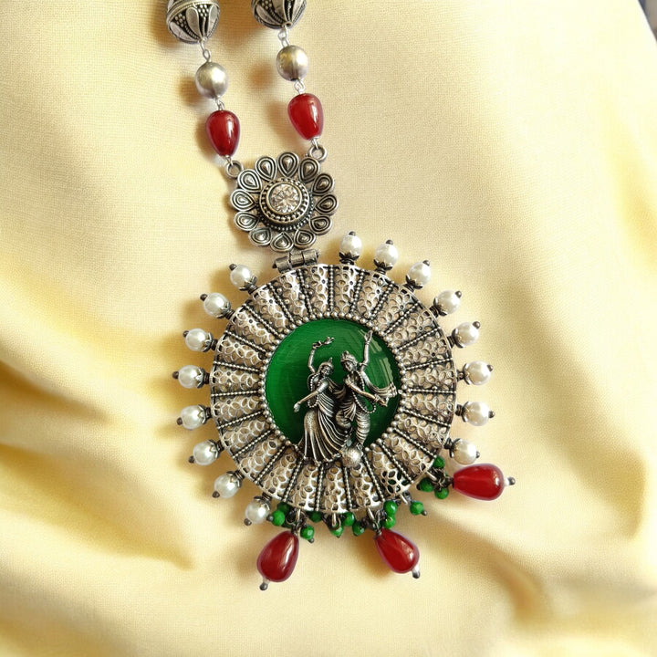 NIDHI SILVER-PLATED GREEN RADHE KRISHNA NECKLACE SET