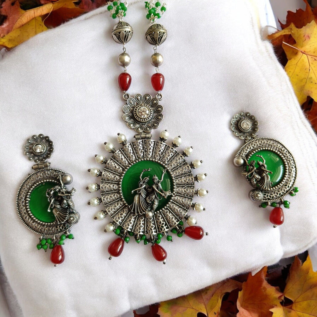 NIDHI SILVER-PLATED GREEN RADHE KRISHNA NECKLACE SET