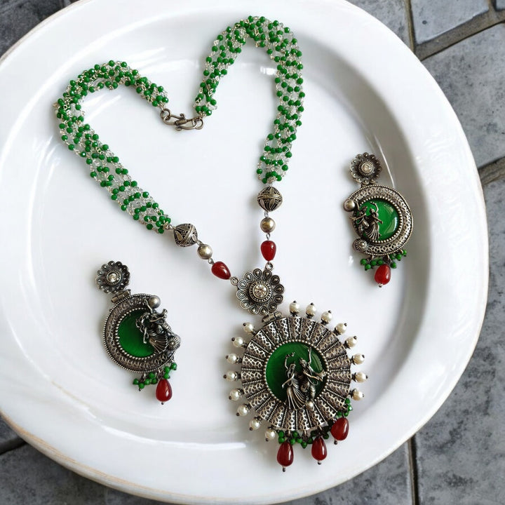 NIDHI SILVER-PLATED GREEN RADHE KRISHNA NECKLACE SET